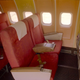 Photo of first class seats on a Braniff Airways 727 flight in the early 1970s (Braniff Airways Foundation, Braniff Flying Colors Collection, Dallas, Texas)